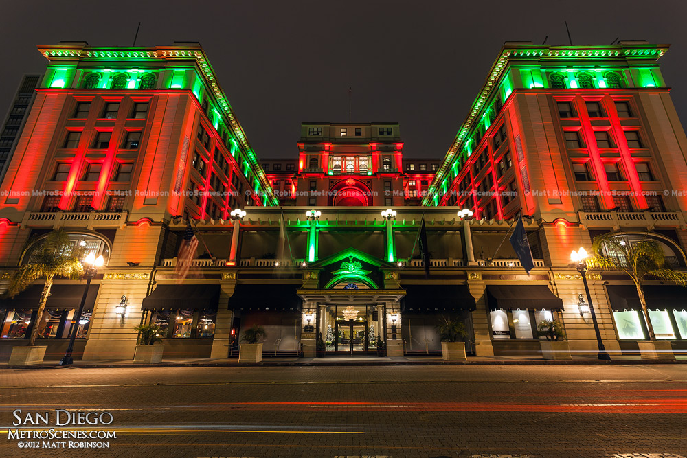 The US Grant Hotel illuminated red and green for the Holidays