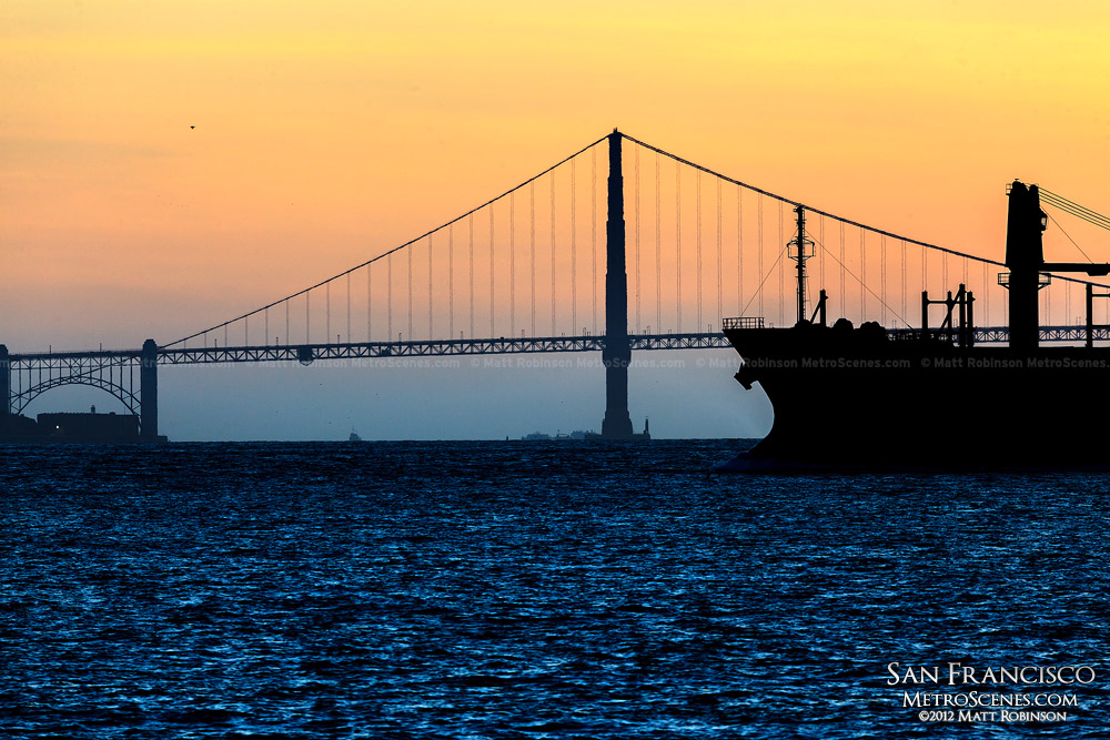 Silhouette of the Golden Gate Bridge and oil tanker