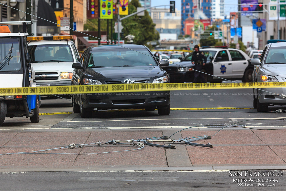 MUNI lines lay on the ground at Market Street