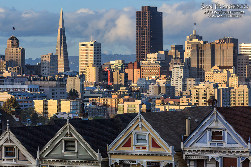 San Francisco Skyline rises above Victorian Houses