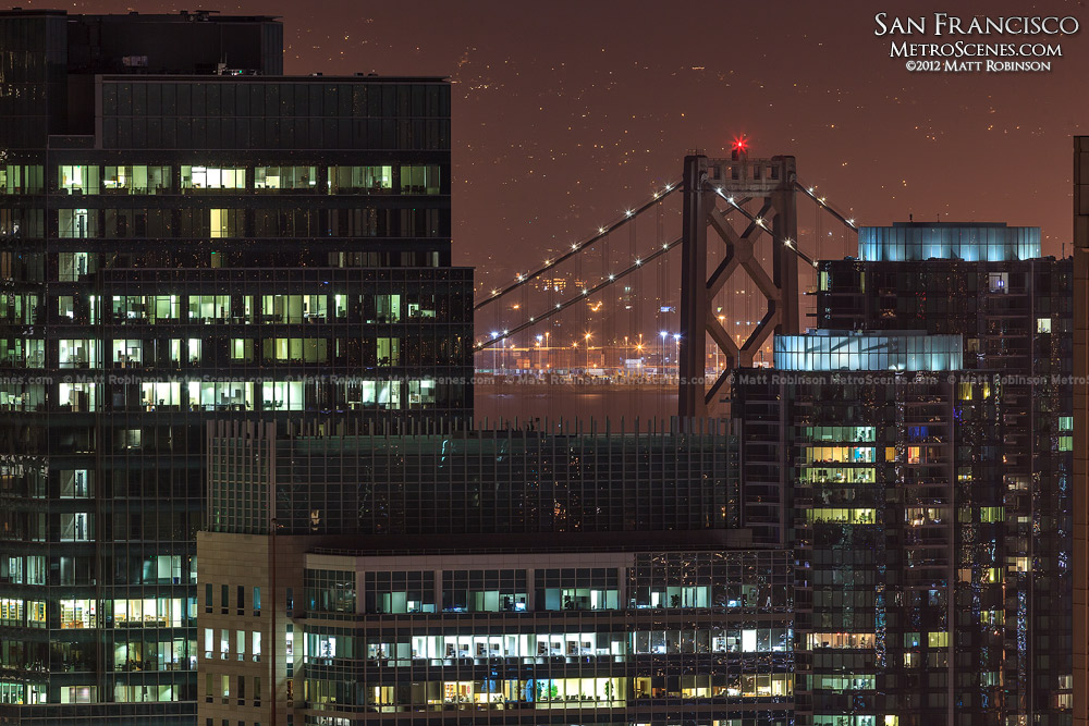 Bay Bridge peeks over San Francisco buildings