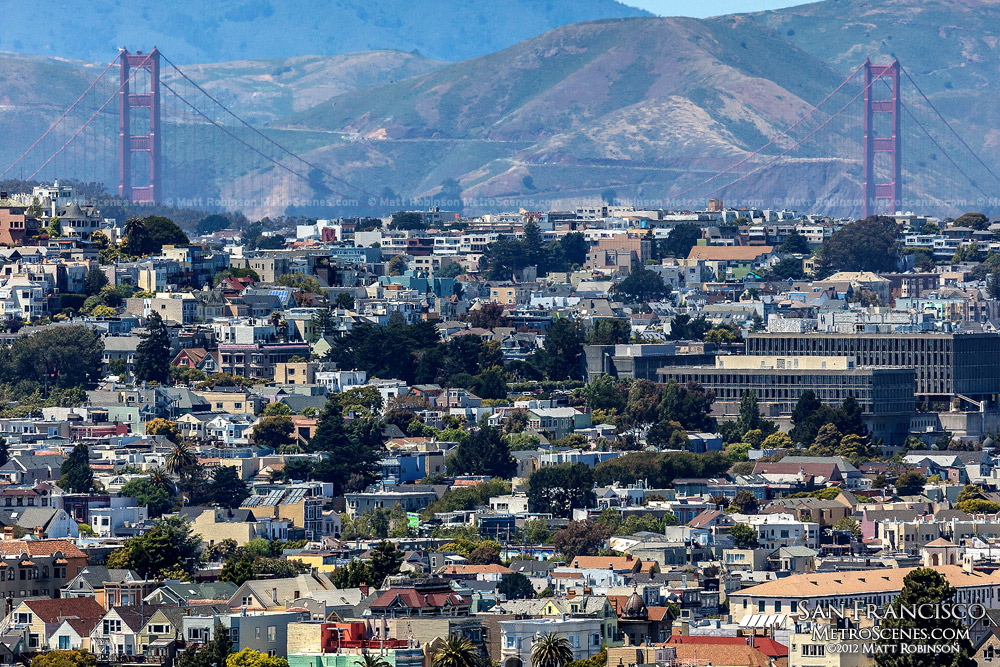 Golden Gate Bridge rises over Laurel Heights