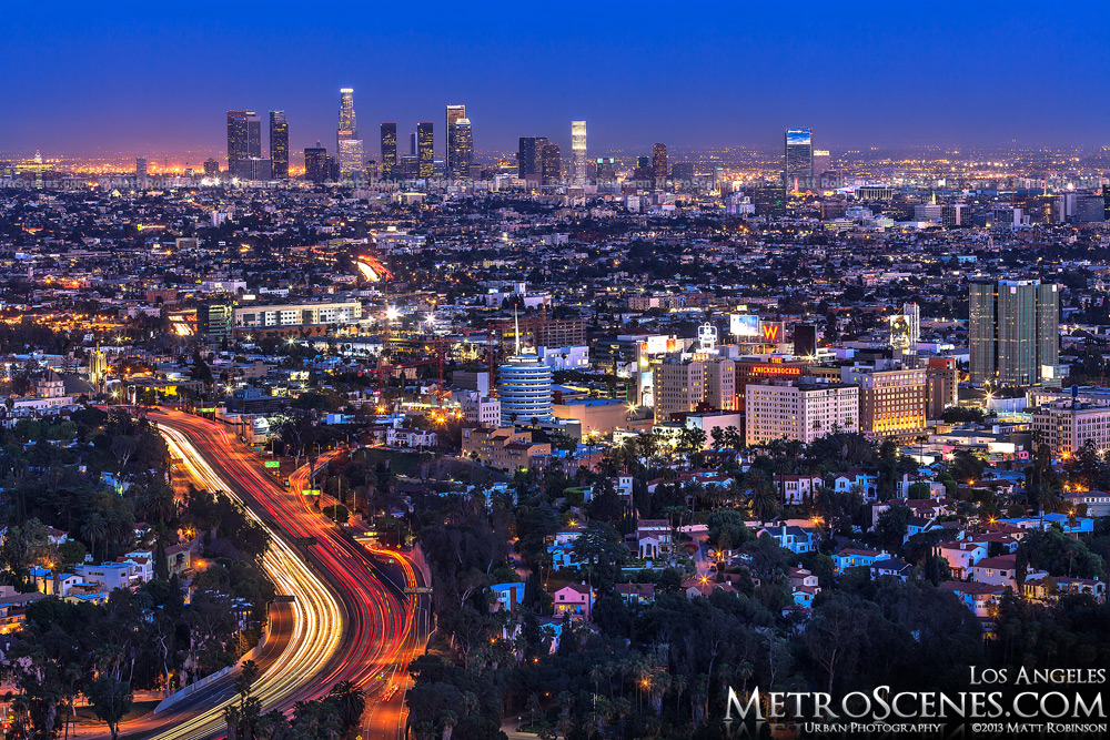 Traffic snakes along with the Hollywood Freeway with Los Angles skyline