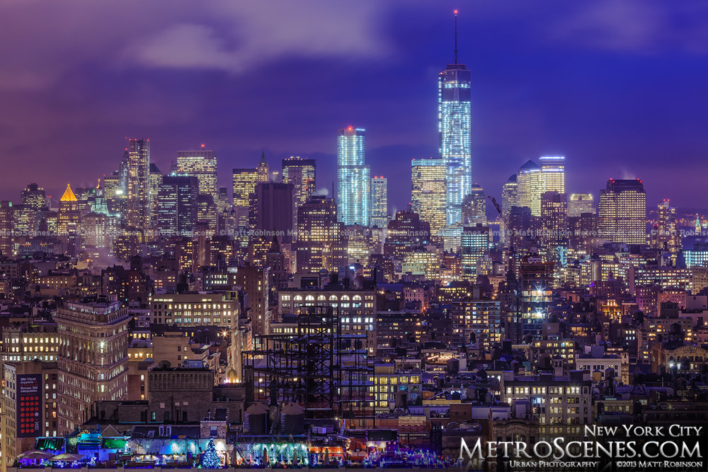 Downtown Manhattan with low clouds at night