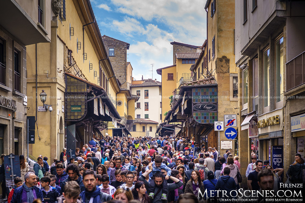 Crowds of pedestrians on Ponte Vecchio