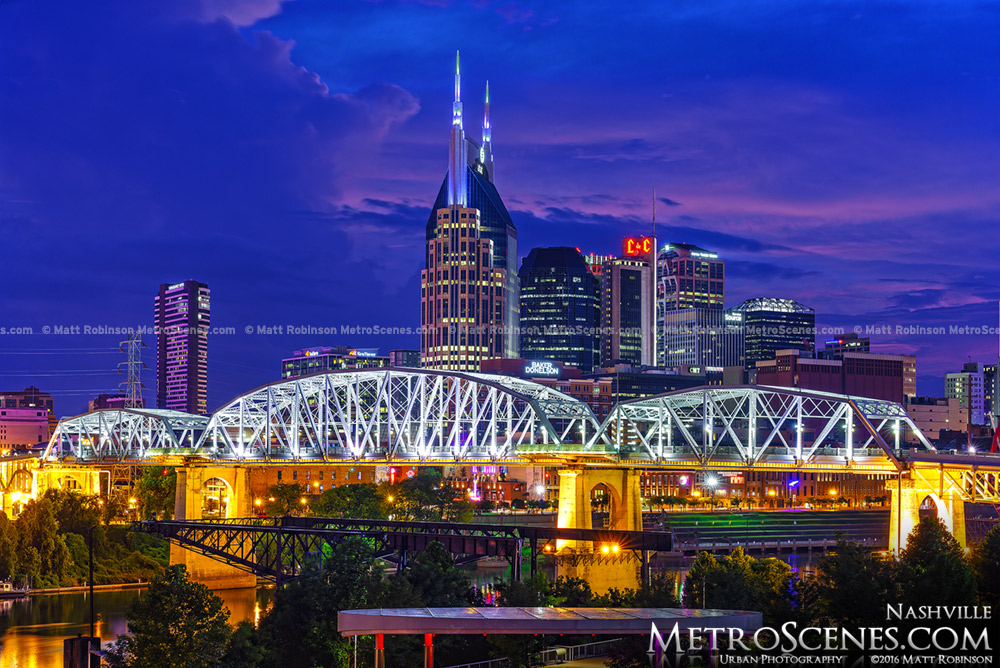 Batman Building in Nashville with the John Seigenthaler Pedestrian Bridge at night