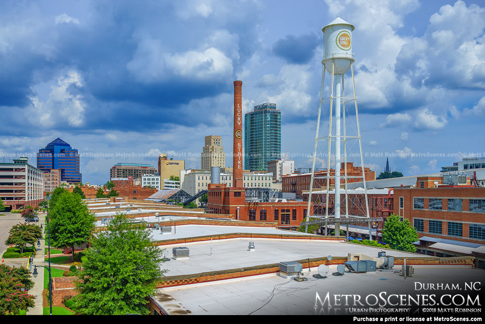 Lucky Strike Water Tower and Smokestack at the American Tobacco Campus with One City Center and Hill Building in Durham North Carolina