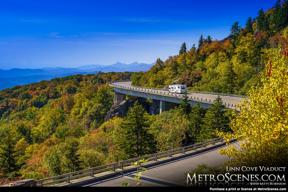 RV drives across the Linn Cove Viaduct during Autumn Fall Foliage